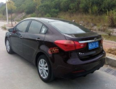 起亚k3暗樱红,时尚动感，个性张扬的紧凑型轿车”